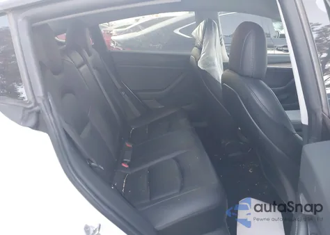 2021 Tesla Model 3 Standard Range Plus Rear-Wheel Drive z USA, uszkodzony, nr VIN 5YJ3E1EA1MF065954